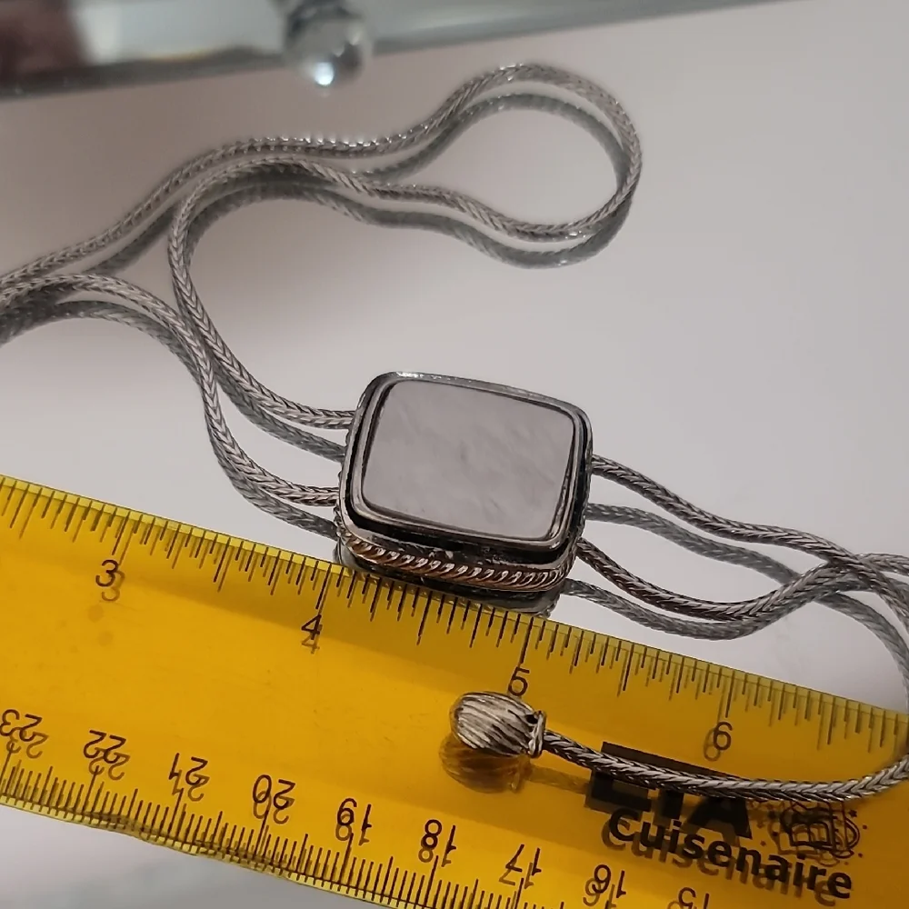 NWOT Silver Bolo Tie With Mother Of Perl Accent.